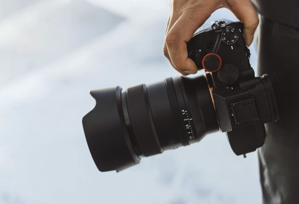 photographer-with-a-camera-at-faroe-islands-part-2023-11-27-05-00-47-utc